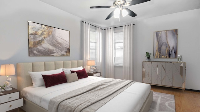 bedroom featuring wood finished floors and ceiling fan