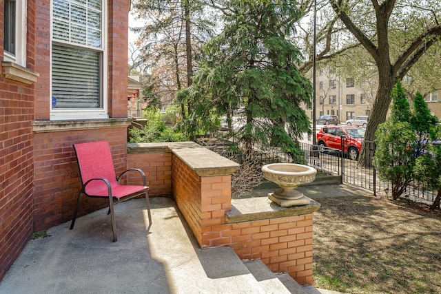 view of patio with fence