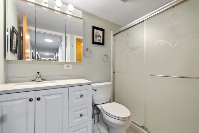 5540 Walnut Ave Unit 22C, Downers Grove, IL 60515 - bathroom with toilet, a shower stall, and vanity