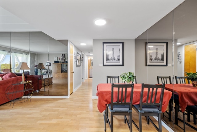 5540 Walnut Ave Unit 22C, Downers Grove, IL 60515 - dining area featuring light wood-style floors, recessed lighting, and baseboards