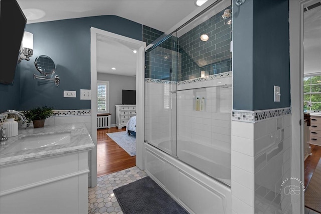 6N225 Circle Ave, Medinah, IL 60157 - full bathroom featuring radiator, shower / bath combination with glass door, vanity, ensuite bath, and plenty of natural light