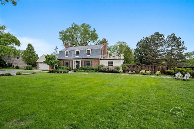 6N225 Circle Ave, Medinah, IL 60157 - colonial inspired home featuring a chimney, a garage, brick siding, and driveway