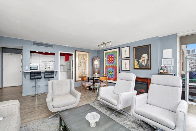 6301 N Sheridan Rd Unit 20J, Chicago, IL 60660 - living room featuring wood finished floors