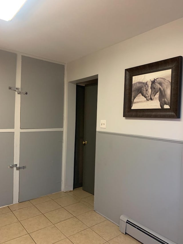 7324 W 80th St, Bridgeview, IL 60455 - interior space with light tile patterned flooring and baseboard heating