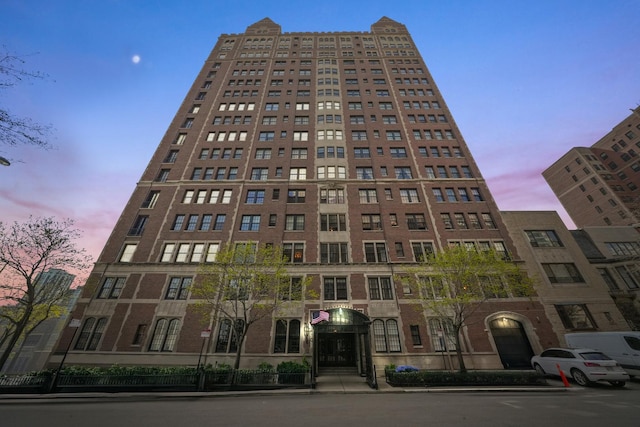 view of property at dusk