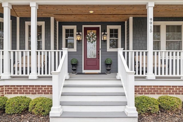 doorway to property with covered porch