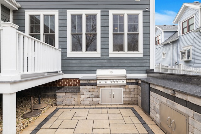 view of patio / terrace with grilling area and exterior kitchen