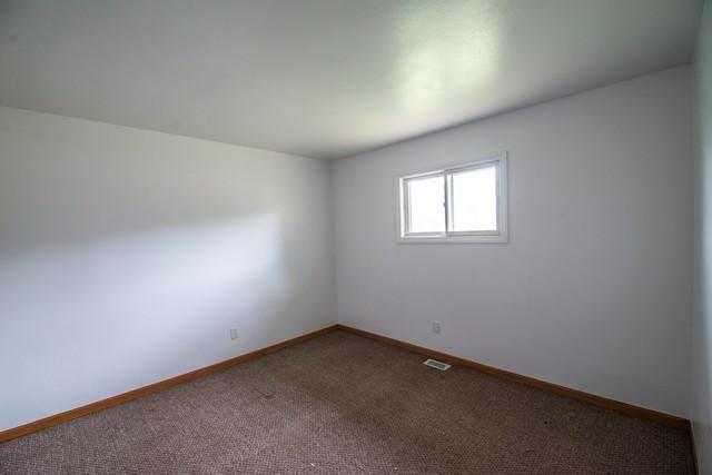34830 47th St, Burlington, WI 53105 - carpeted spare room featuring baseboards