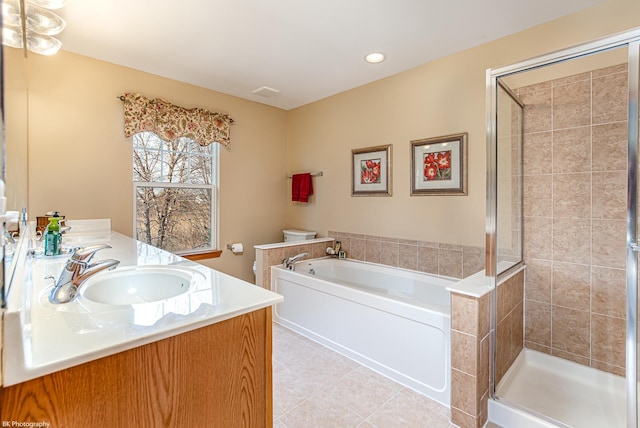 12941 Grande Poplar Cir, Plainfield, IL 60585 - bathroom featuring double vanity, a bath, a stall shower, and a sink