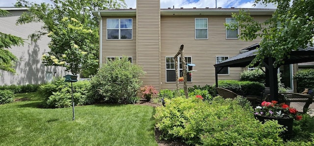 12941 Grande Poplar Cir, Plainfield, IL 60585 - rear view of property featuring a yard, a gazebo, and a chimney