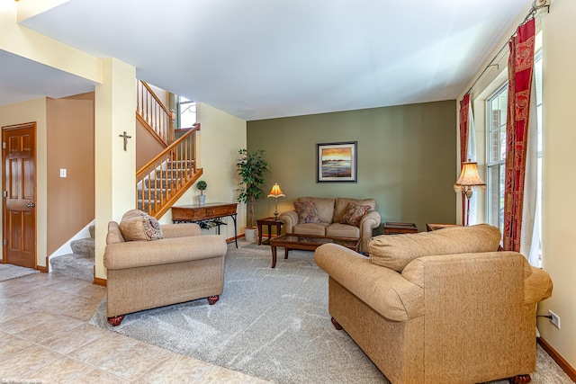 12941 Grande Poplar Cir, Plainfield, IL 60585 - living room featuring baseboards, stairway, and plenty of natural light