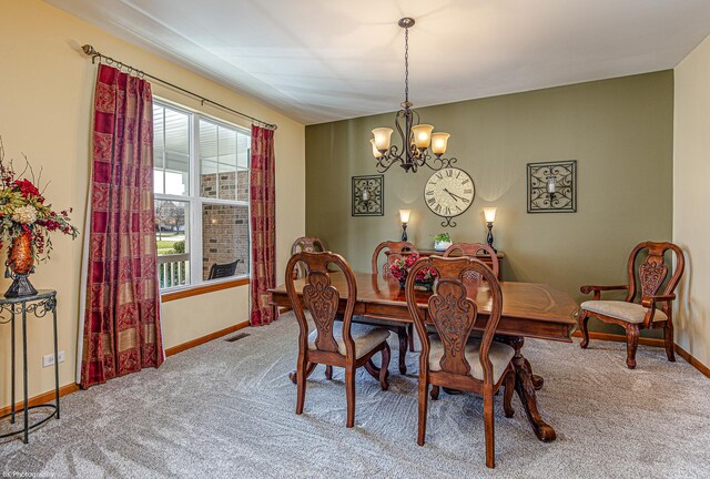 12941 Grande Poplar Cir, Plainfield, IL 60585 - dining space with baseboards, visible vents, a notable chandelier, and carpet flooring