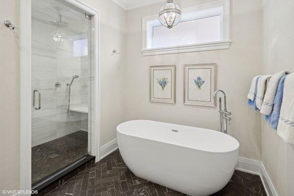 454 W Barry Ave Unit 1, Chicago, IL 60657 - full bath featuring baseboards, a shower stall, a chandelier, a soaking tub, and marble finish floors