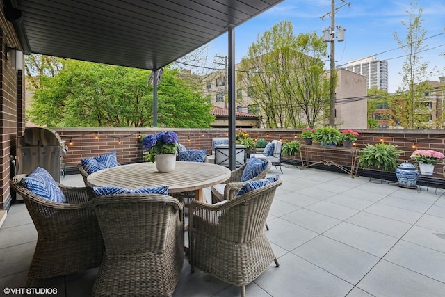 454 W Barry Ave Unit 1, Chicago, IL 60657 - view of patio with outdoor dining area and fence