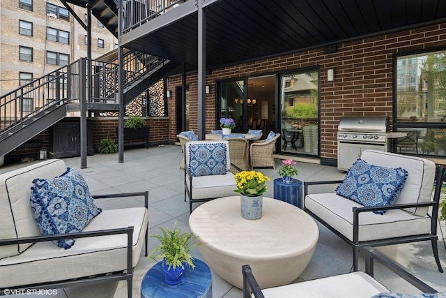 454 W Barry Ave Unit 1, Chicago, IL 60657 - view of patio featuring stairway, an outdoor hangout area, grilling area, and outdoor dining space