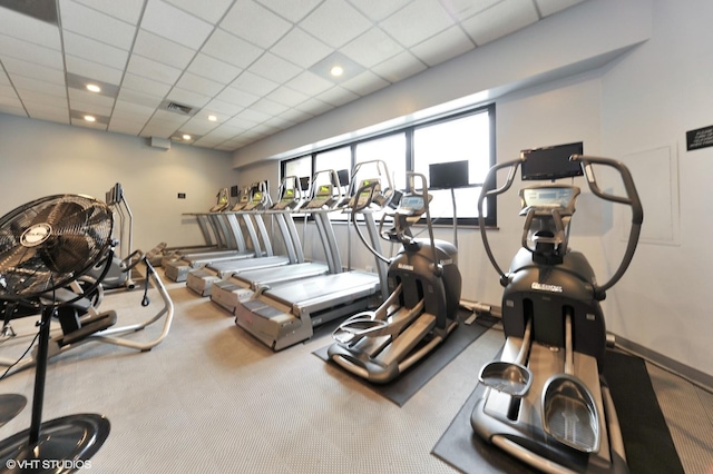 1030 N State St Unit 21K, Chicago, IL 60610 - workout area featuring visible vents, a paneled ceiling, carpet flooring, and baseboards