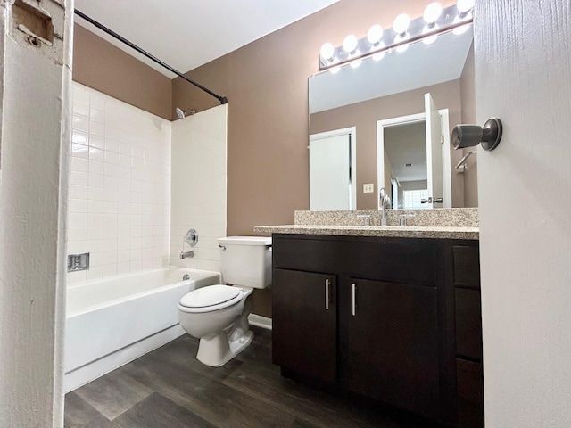 1915 N Hicks Rd Unit 105, Palatine, IL 60074 - bathroom with toilet, vanity, tub / shower combination, and wood finished floors