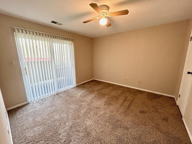 1915 N Hicks Rd Unit 105, Palatine, IL 60074 - carpeted empty room featuring ceiling fan, visible vents, and baseboards