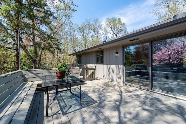 deck featuring outdoor dining space