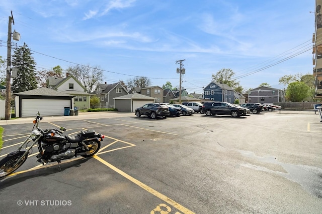 7428 Washington St Unit 304, Forest Park, IL 60130 - uncovered parking lot featuring a residential view