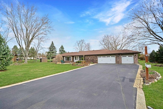 25441 N Marilyn Ln, Hawthorn Woods, IL 60047 - single story home featuring brick siding, a front yard, an attached garage, and aphalt driveway