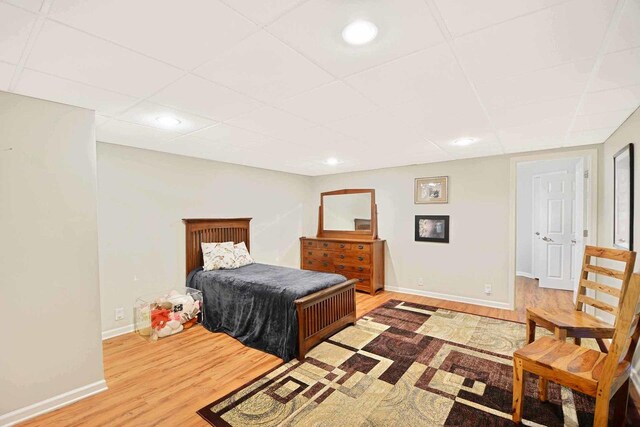 25441 N Marilyn Ln, Hawthorn Woods, IL 60047 - bedroom featuring recessed lighting, a paneled ceiling, wood finished floors, and baseboards