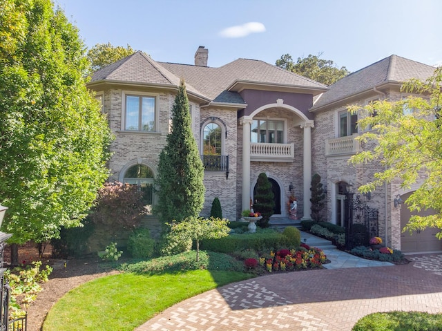 113 Carmela Ct, Bloomingdale, IL 60108 - view of front facade with a balcony and a chimney