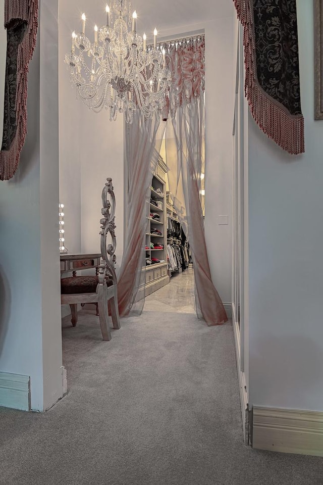 113 Carmela Ct, Bloomingdale, IL 60108 - corridor featuring carpet and a chandelier