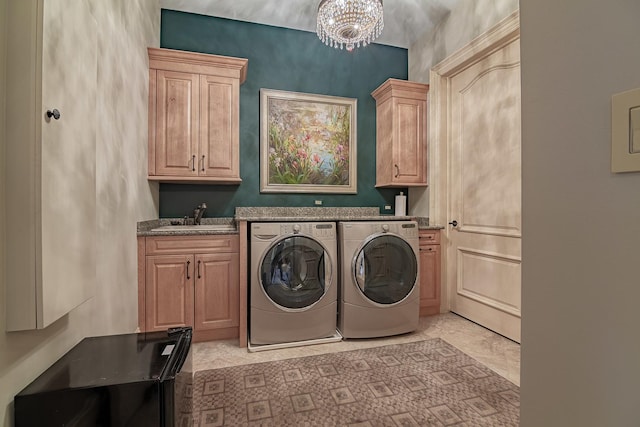 113 Carmela Ct, Bloomingdale, IL 60108 - laundry area with cabinet space, separate washer and dryer, and a chandelier