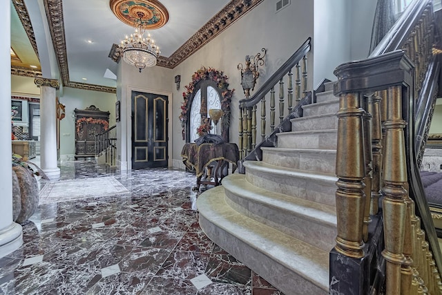 113 Carmela Ct, Bloomingdale, IL 60108 - entryway featuring stairs, a chandelier, decorative columns, and marble tiled floors