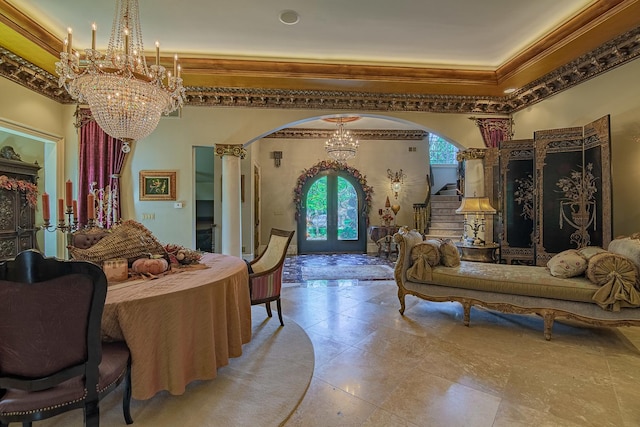 113 Carmela Ct, Bloomingdale, IL 60108 - bedroom featuring a chandelier, arched walkways, french doors, ornamental molding, and ornate columns