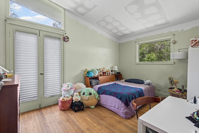 2110 Heather Rd, Geneva, IL 60134 - bedroom featuring wood-type flooring and lofted ceiling