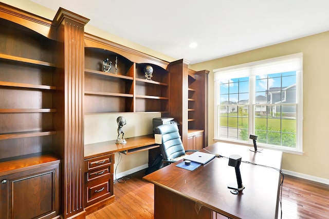35 Open Pkwy N, Hawthorn Woods, IL 60047 - office area with built in study area, baseboards, and light wood-style floors