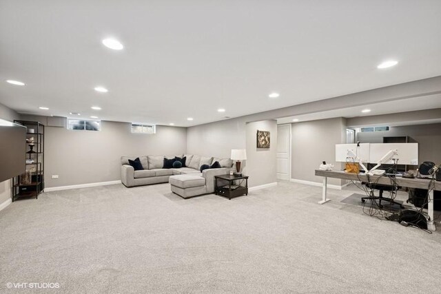 living room featuring baseboards, carpet flooring, and recessed lighting