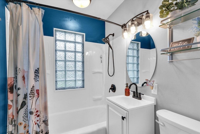 1304 Briarcliff Dr, Urbana, IL 61801 - full bathroom with vanity, shower / bath combination with curtain, toilet, and healthy amount of natural light