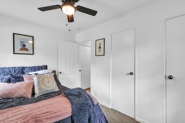 1304 Briarcliff Dr, Urbana, IL 61801 - carpeted bedroom with ceiling fan and baseboards