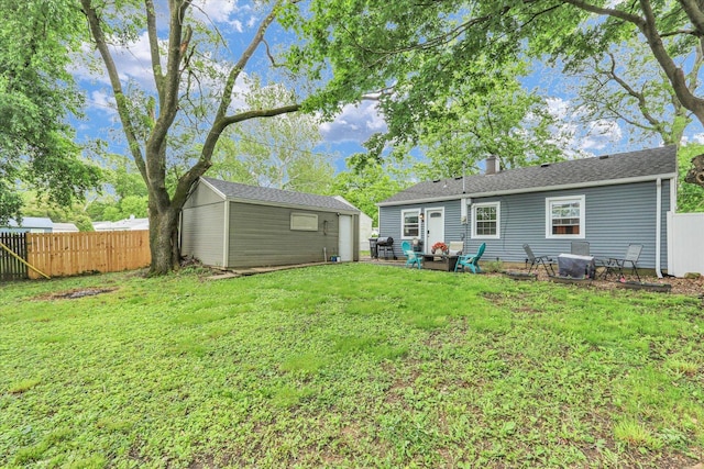 1304 Briarcliff Dr, Urbana, IL 61801 - rear view of property featuring an outdoor structure and a chimney