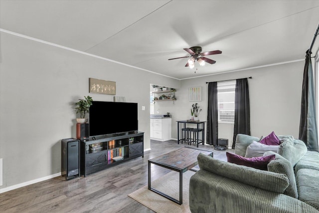 1304 Briarcliff Dr, Urbana, IL 61801 - living area featuring a ceiling fan, wood finished floors, baseboards, and crown molding
