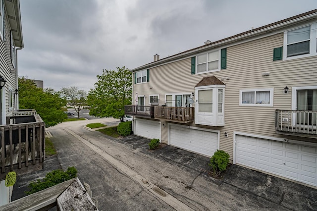 1126 Village Center Pkwy Unit 6, Aurora, IL 60506 - exterior space with an attached garage and driveway