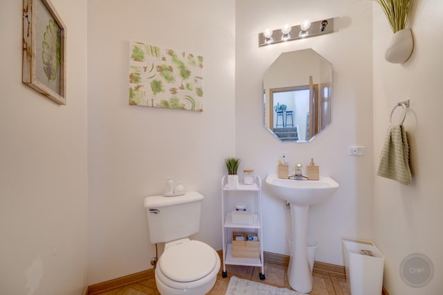 1126 Village Center Pkwy Unit 6, Aurora, IL 60506 - bathroom featuring toilet and baseboards