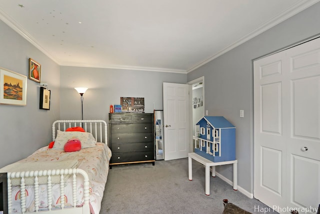 carpeted bedroom featuring baseboards and ornamental molding