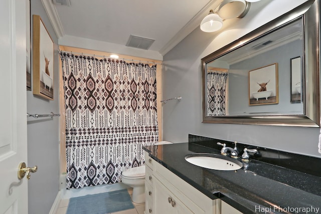 bathroom with vanity, toilet, tile patterned floors, visible vents, and ornamental molding