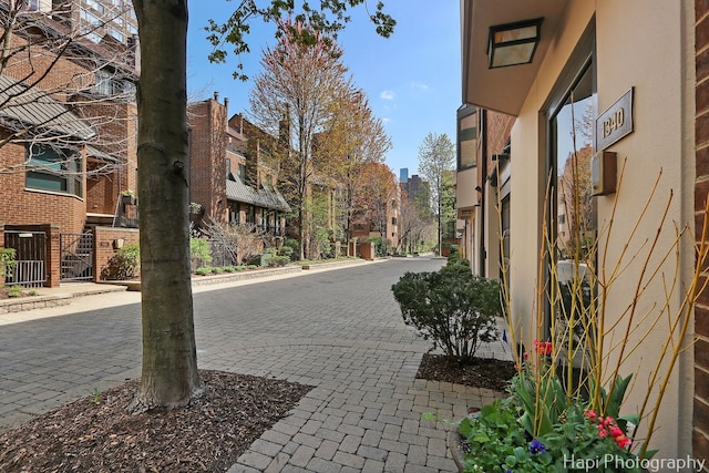 view of road featuring sidewalks and curbs