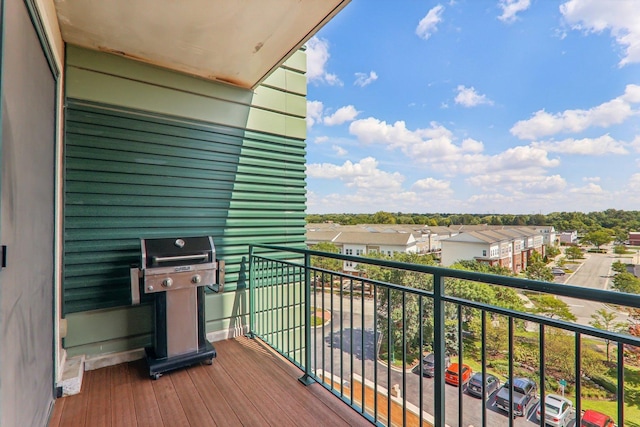 balcony featuring a grill and a residential view