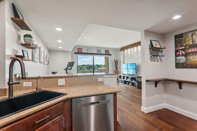 kitchen with open shelves, a sink, dark wood-style flooring, dishwasher, and a peninsula