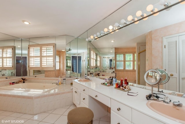 18W742 60th St, Westmont, IL 60559 - full bath featuring a garden tub, tile patterned flooring, a closet, and a sink