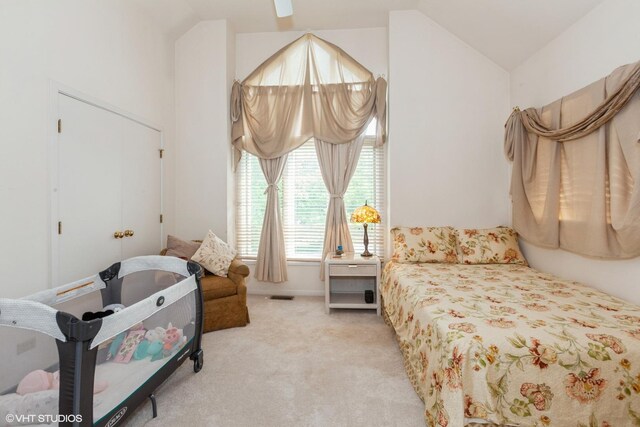 18W742 60th St, Westmont, IL 60559 - bedroom featuring visible vents, light carpet, and lofted ceiling