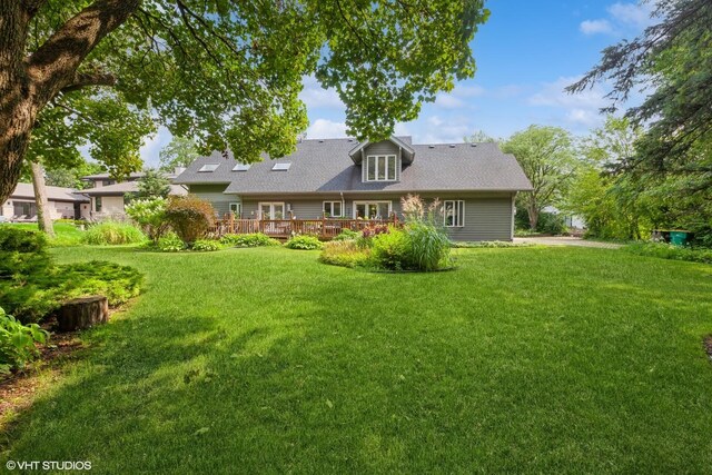 18W742 60th St, Westmont, IL 60559 - back of property featuring a deck and a lawn
