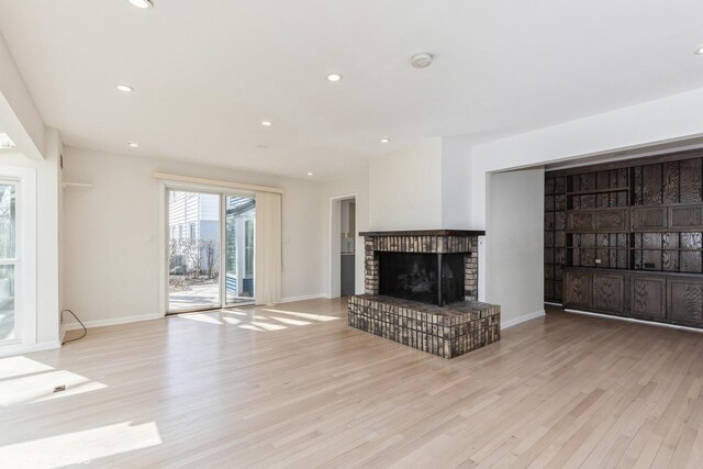 127 Riverside Dr, Northfield, IL 60093 - unfurnished living room featuring a fireplace, wood finished floors, recessed lighting, and baseboards