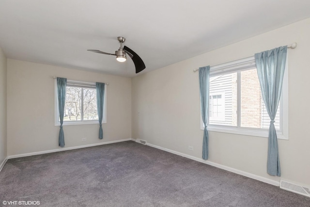 127 Riverside Dr, Northfield, IL 60093 - spare room featuring a ceiling fan, visible vents, carpet floors, and baseboards